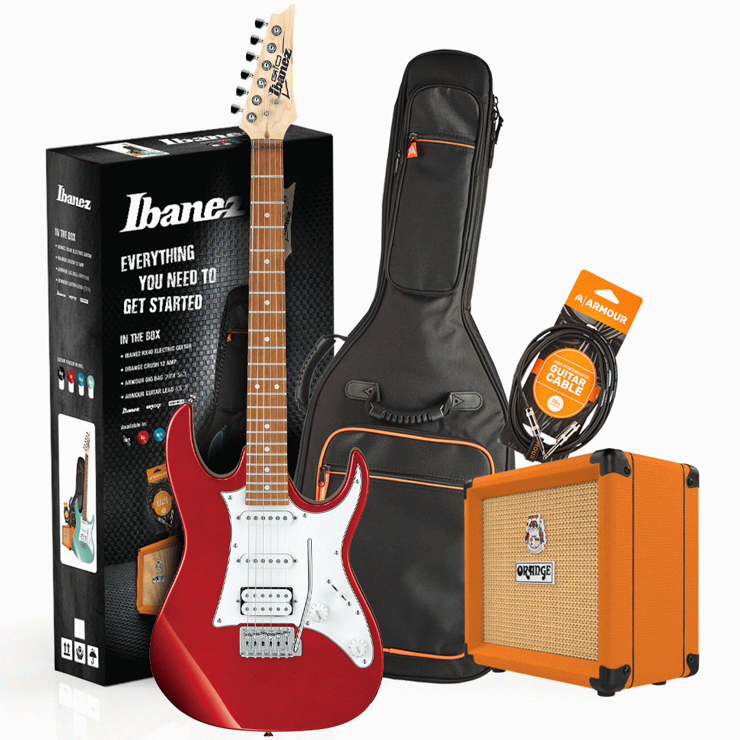 Red electric guitar with accessories including a case, cable, and amplifier on a white background